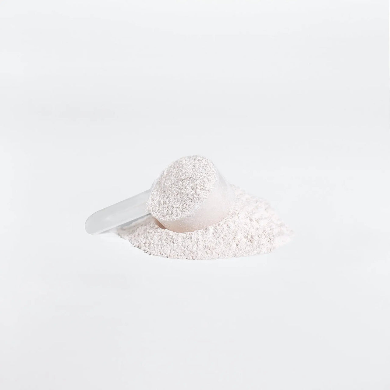 BCAA Shock Powder (Fruit Punch, close up of scoop containing powder mix
