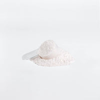 BCAA Shock Powder (Fruit Punch, close up of scoop containing powder mix